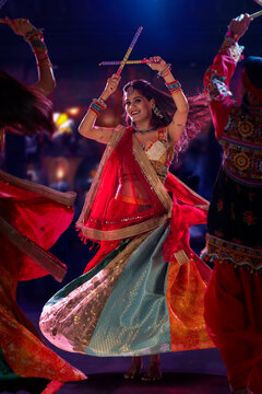Gujrati woman performing Garba on stage