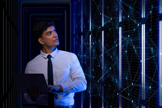 Technician working on the server in the data storage room. 