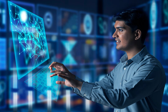 Digitally enhanced shot of a  technician/businessman working with virtual reality projection