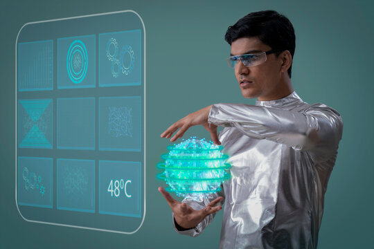 A man wearing silver,futuristic  clothes holding digital globe ,future technology concept