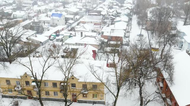 Voronezh, Russia, January 3, 2026: Winter residential area of ​​Voronezh with private sector and multi-story buildings, view from above