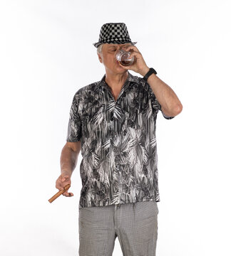 Male businessman with a pipe in a gray suit isolated on white background