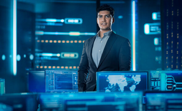 Digitally enhanced portrait of a businessman  superimposed over multiple screens of virtual reality projections and screens