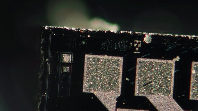 Macro Close-up Shot of Microchip, CPU Processor on Printed Circuit Board, Computer Motherboard with Components Inside of Electronic Device, Part of Supercomputer microscop.