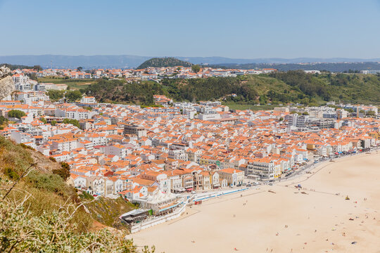 Aerial view of the city of Nazare, Portugal and the Praia, Portugal