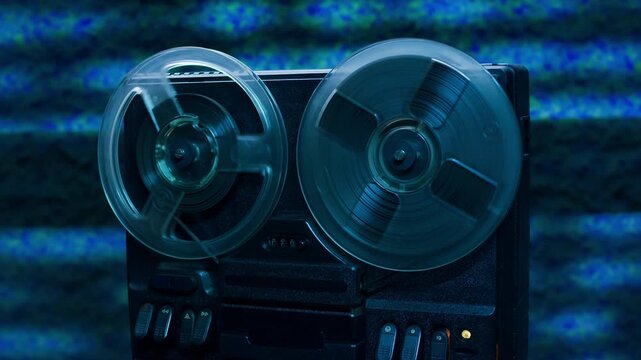 Tape audio music player, VHS studio magnetic tape, vintage retro spool reel to reel player and recorder, magnetic tape data storage close up, music studio. 
