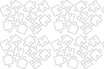 Obraz premium Jigsaw puzzle pieces scattered. Uncompleted puzzle background