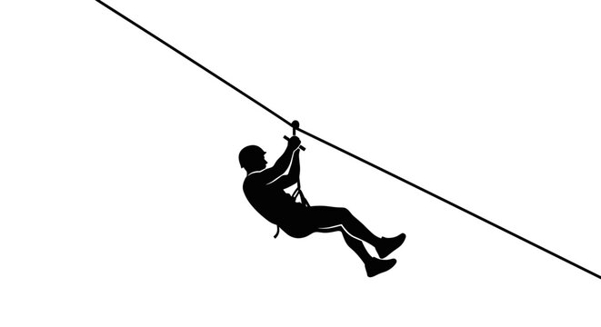 Man riding zipline at night.