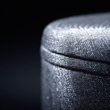 fencing foil tip shining under studio light sports equipment macro