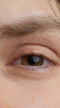 Human eye medical examination showing mydriasis close up