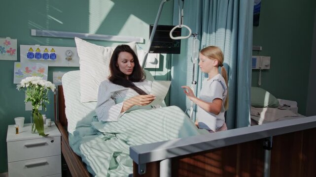 Girl shares handmade card with recovering mother in hospital