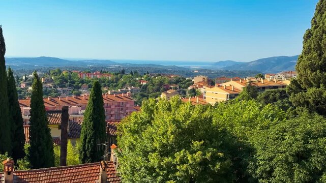 Pink umbrellas on medieval streets of the world capital of perfumery Grasse, Provence, Alps, Cote d'Azur France July 6, 2026. High quality 4k footage