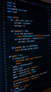Closeup of computer monitor displaying colorful Python source code