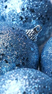 New year blue spruce tree decoration balls. Rotate. Christmas celebration. Winter holidays. Vertical footage