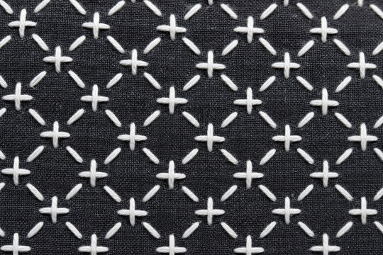 Japanese sashiko cross stitch pattern charcoal fabric white thread texture