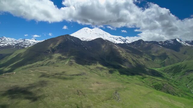 A beautiful view of the snowy peaks of Mount Elbrus. The landscape and nature of the North Caucasus.