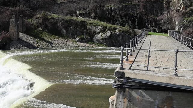 Water release, due to heavy rains, at the El Villar Dam in the province of Madrid, Spain