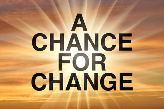 Motivational business text a chance for change against a glowing sunrise sky background