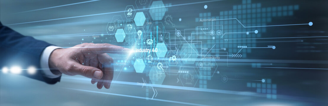 Plant manager skillfully touching holographic display monitoring Industry 4.0 implementation over the manufacturing network grid. Supervisor evaluating smart factory production workflows.