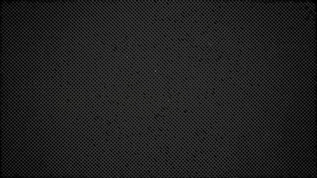 Dark carbon fiber mesh texture a repeating geometric pattern with a matte black finish grid