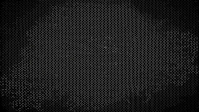 Dark carbon fiber mesh texture with a subtle hexagonal pattern and black background geometric grid