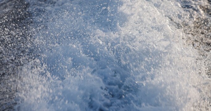 White foamy wake left by boat closeup