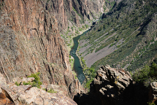 The Gunnison River deep in the valleys of the mountains in Colorado