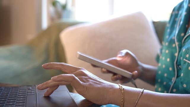 Person using smartphone and laptop for AI powered business workflow, mobile communication, email management, cloud collaboration, SaaS platform, remote work and digital productivity concept