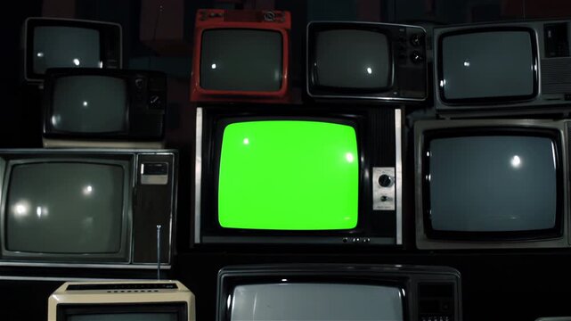 Dolly In On Retro CRT Television Stack With Iron Tone And Green Screen - 4K
