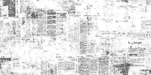 Obraz premium Newspaper clippings with faded and torn edges in a collage formation slowly disintegrating