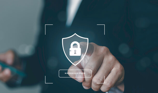 Close up businessman pointing at digital shield padlock and password bar icon. Cybersecurity authentication, secure login access, and data privacy protection concept for technology.