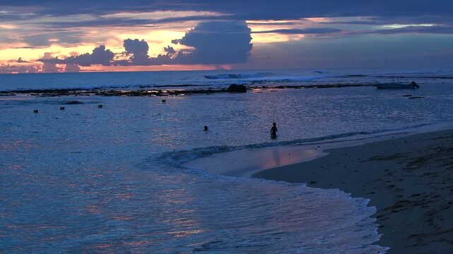 People Enjoying Sunset at Polhena Beach, Sri Lanka