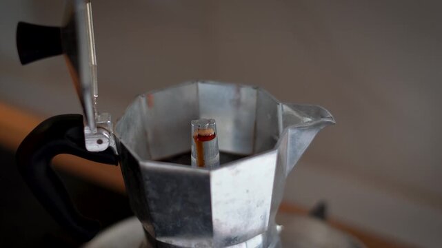 Making Moka Coffee Preparation of espresso coffee using the retro Italian Moka pot.