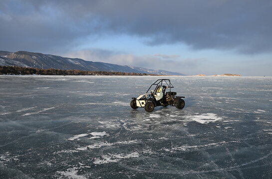 Buggy riding on the ice of frozen Lake Baikal