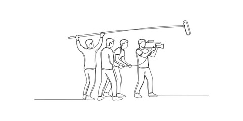 Film crew team working with a video camera and boom microphone for movie production © SR