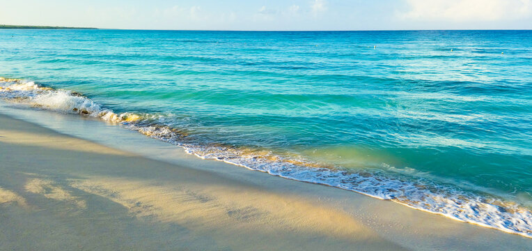 Dominicus beach with white sand and bluw waves in early morning 
