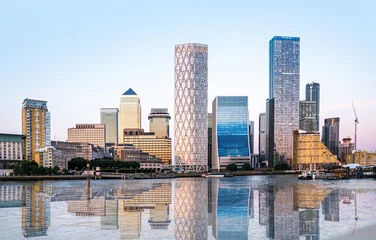 Canary Wharf view at sunset with beautiful reflection in Thames water. UK 2026 © IRStone