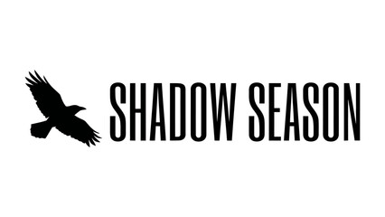 Naklejka premium Shadow Season Logo: A striking silhouette of a raven in flight is positioned to the left of bold, uppercase text that reads SHADOW SEASON.