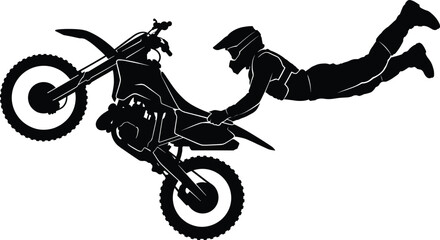 Black silhouette of an extreme freestyle motocross rider performing a stunt isolated on white background © MdMenhajul