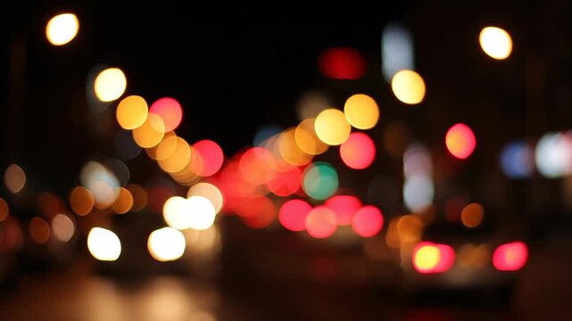 Blurred City Street Light Circular Bokeh in Red and Yellow Tones at Night
