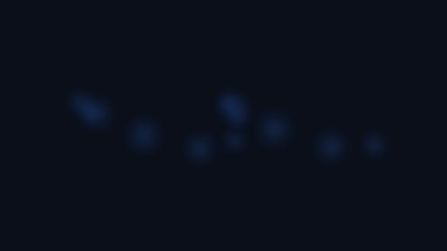 Subtle blue light glows emerging from the deep darkness of the night sky