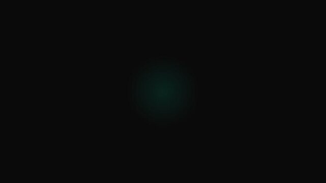 A small glowing green geometric pattern centered in a vast dark void
