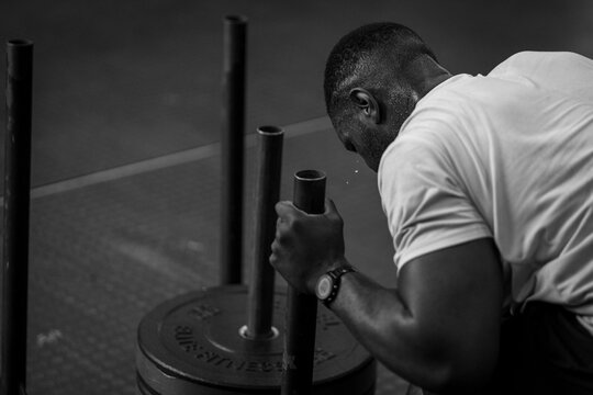 Cross fit Hyrox training exercises sled push
