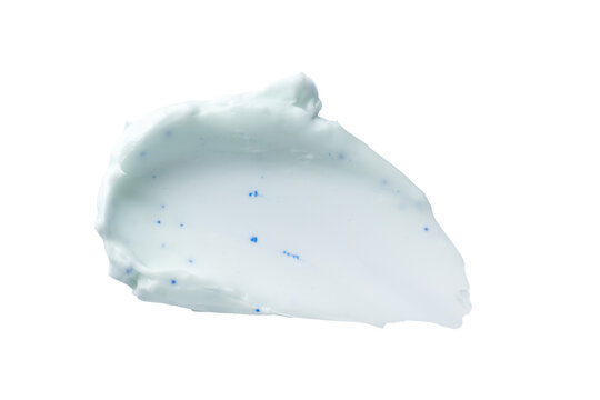 Blue exfoliating cosmetic cream smear with microbeads isolated on transparent background, skincare cleansing scrub or toothpaste texture sample for beauty product design.