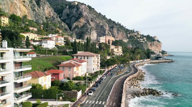 Aerial view of Menton France showcasing Mediterranean coastline and historic town from above