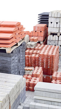 A place where materials for infrastructure and superstructure construction, such as roadside paving stones, are stored.