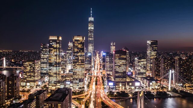 Modern city skyline and highway traffic at twilight