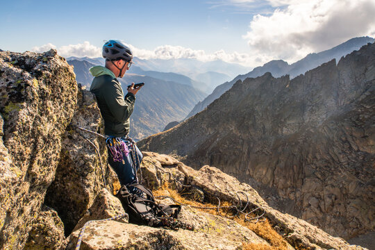 Climber in Aiguestortes National Park in Pyrenees