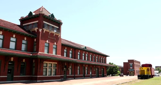 Afternoon sun shines on the historic train station of downtown Chanute, Kansas, USA.