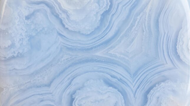 Light blue agate stone surface with intricate patterns and textures, showcasing natural mineral formations and layers in a polished finish